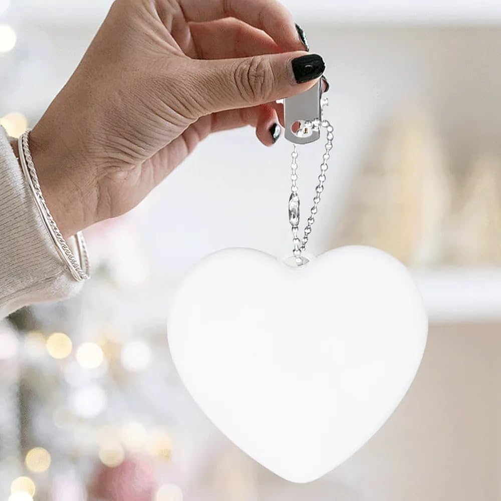 Luz LED con sensor para Carteras (Diseños en Corazón y de Patitas)